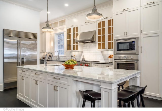 2015 N Howe St, Chicago, IL 60614 - kitchen featuring built in appliances, range hood, a sink, backsplash, and recessed lighting