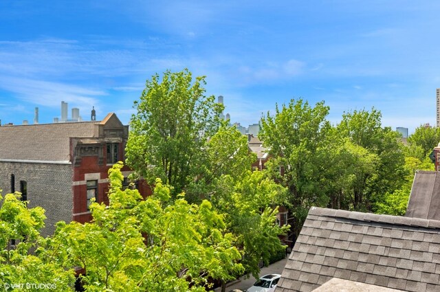 1444 N Bosworth Ave Unit 3S, Chicago, IL 60642 - exterior view of a shingled roof