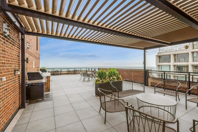 421 W Melrose St Unit 10B, Chicago, IL 60657 - view of patio / terrace with area for grilling, a water view, and outdoor dining area