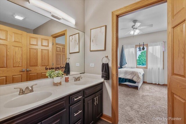3609 Sagebrush Ct, Johnsburg, IL 60051 - bathroom featuring double vanity, ceiling fan, and connected bathroom