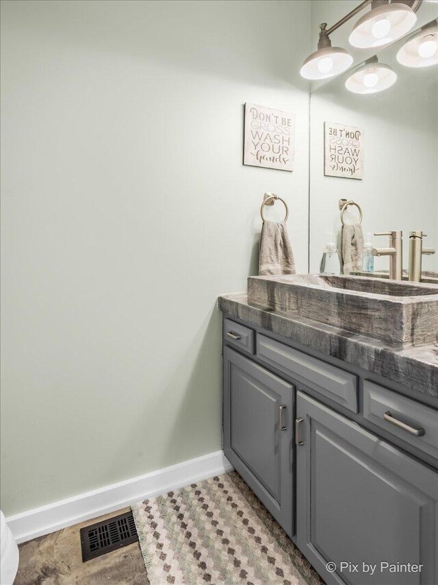 3609 Sagebrush Ct, Johnsburg, IL 60051 - bathroom with baseboards and vanity