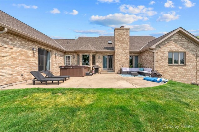 3609 Sagebrush Ct, Johnsburg, IL 60051 - back of property featuring a hot tub, brick siding, an outdoor living space, and a patio