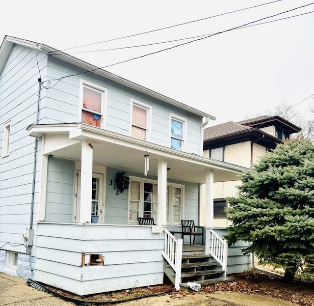 332 N Ave, Aurora, IL 60505 - traditional style home featuring a porch