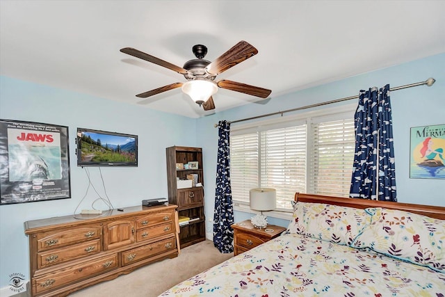 942 Meadowbrook Rd, Elwood, IL 60421 - bedroom with light carpet, a ceiling fan, and baseboards