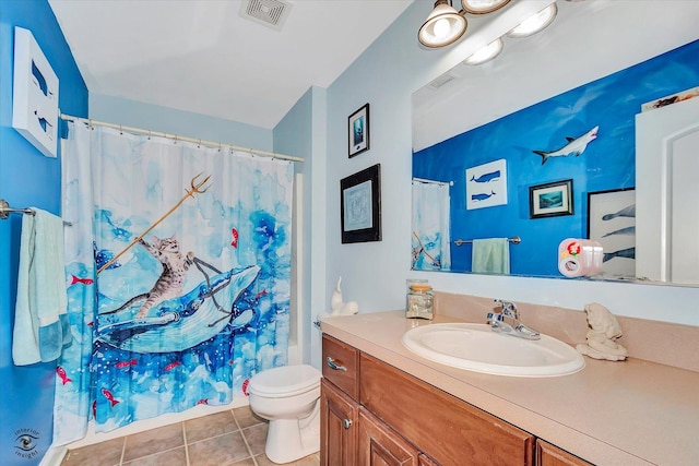 942 Meadowbrook Rd, Elwood, IL 60421 - full bathroom featuring vanity, toilet, tile patterned flooring, and a shower with shower curtain