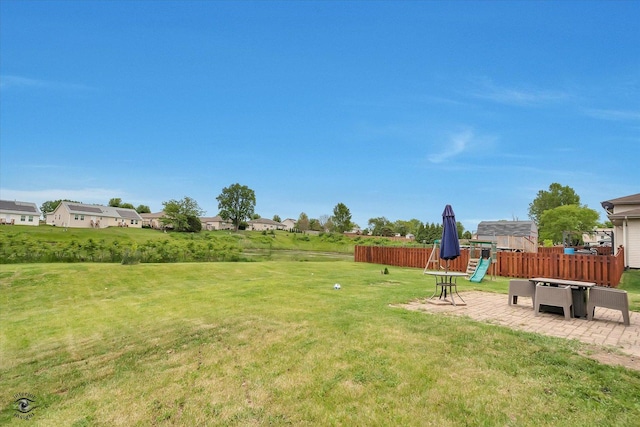 942 Meadowbrook Rd, Elwood, IL 60421 - view of yard featuring a playground, a patio area, and a residential view