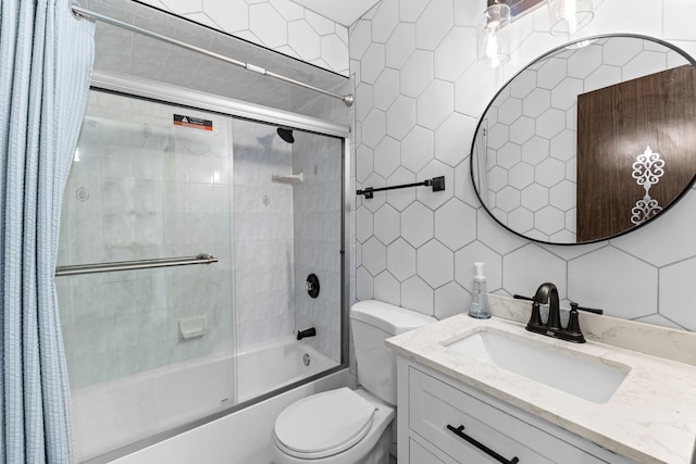 4829 W 109th St Unit 301, Oak Lawn, IL 60453 - bathroom with tile walls, combined bath / shower with glass door, vanity, toilet, and decorative backsplash