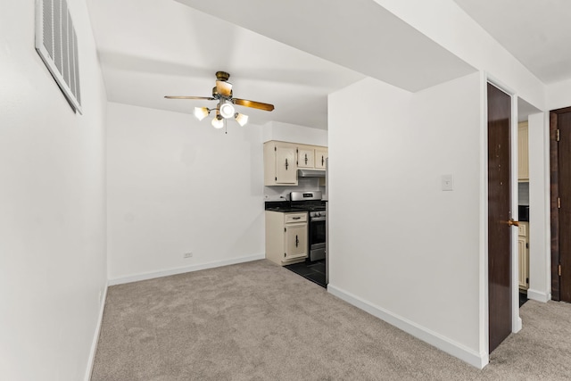 4829 W 109th St Unit 301, Oak Lawn, IL 60453 - kitchen featuring stainless steel gas stove, carpet floors, under cabinet range hood, and baseboards