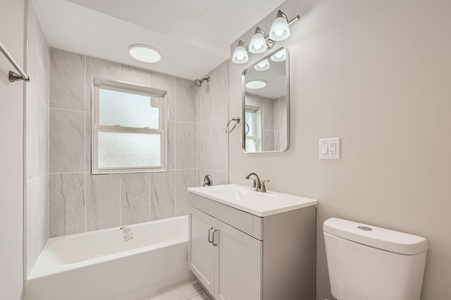 full bath with vanity, toilet, and shower / washtub combination