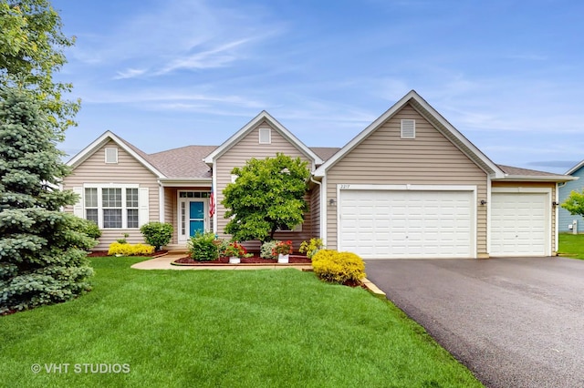 2217 Tyler Trl, Mchenry, IL 60051 - ranch-style home with asphalt driveway, a garage, and a front yard