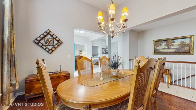 2217 Tyler Trl, Mchenry, IL 60051 - dining room featuring a chandelier and wood finished floors