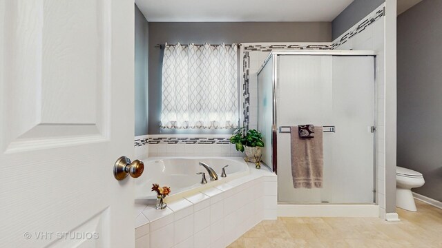 2217 Tyler Trl, Mchenry, IL 60051 - full bath with a garden tub, a shower stall, toilet, and tile patterned flooring