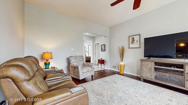 2217 Tyler Trl, Mchenry, IL 60051 - living area with wood finished floors, ceiling fan, baseboards, and a fireplace