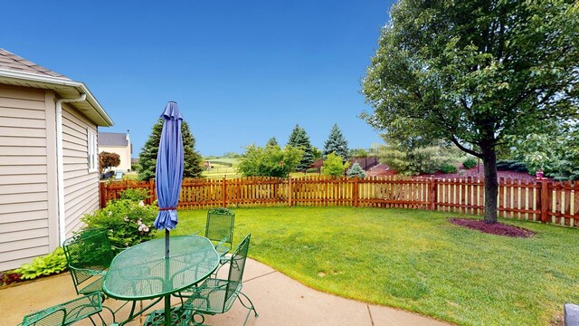 2217 Tyler Trl, Mchenry, IL 60051 - view of yard featuring a patio and outdoor dining area
