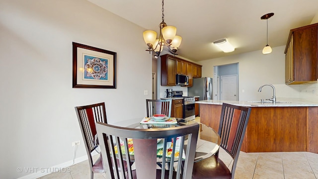 2217 Tyler Trl, Mchenry, IL 60051 - dining room featuring light tile patterned flooring, a chandelier, and baseboards