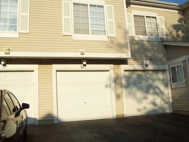 117 Braxton Ln, Aurora, IL 60504 - garage featuring driveway