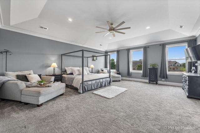 1044 Redbud Ln, Sugar Grove, IL 60554 - carpeted bedroom with a tray ceiling, multiple windows, lofted ceiling, ceiling fan, and recessed lighting