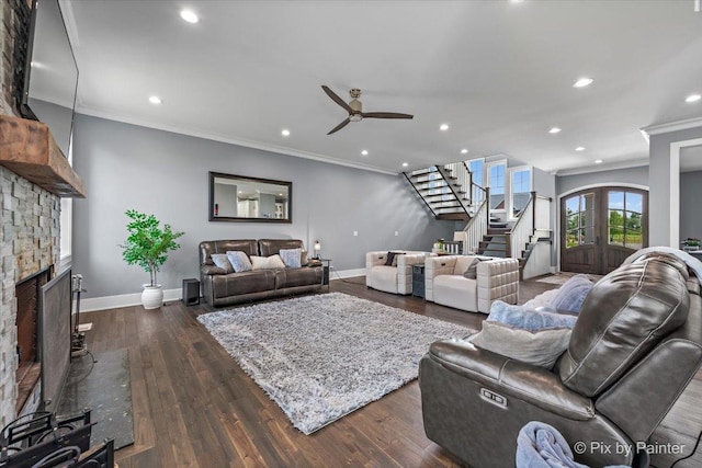 1044 Redbud Ln, Sugar Grove, IL 60554 - living area with stairway, crown molding, ceiling fan, a stone fireplace, and recessed lighting