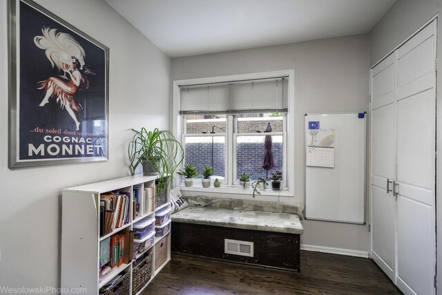 3315 N Racine Ave Unit E, Chicago, IL 60657 - sitting room with dark wood-style floors and baseboards