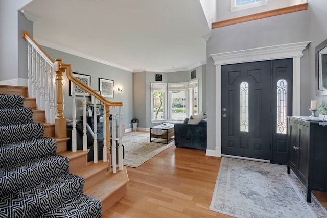 785 N Emroy Ave, Elmhurst, IL 60126 - entrance foyer featuring stairway, light wood finished floors, baseboards, and ornamental molding