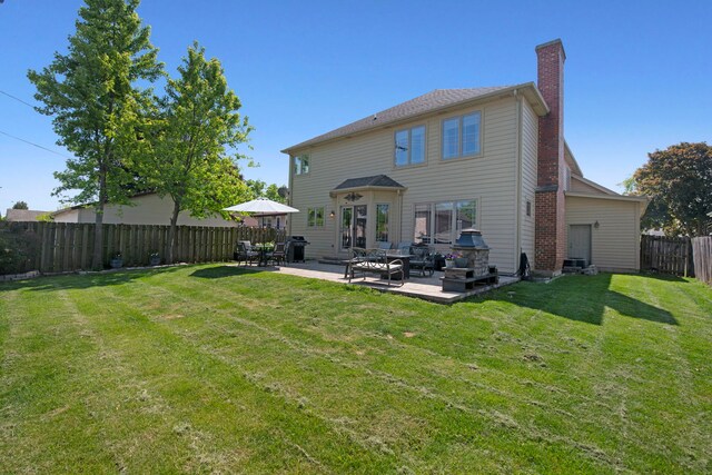 785 N Emroy Ave, Elmhurst, IL 60126 - back of house with a chimney and a patio area