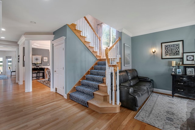 785 N Emroy Ave, Elmhurst, IL 60126 - stairs featuring wood finished floors, baseboards, recessed lighting, and ornamental molding