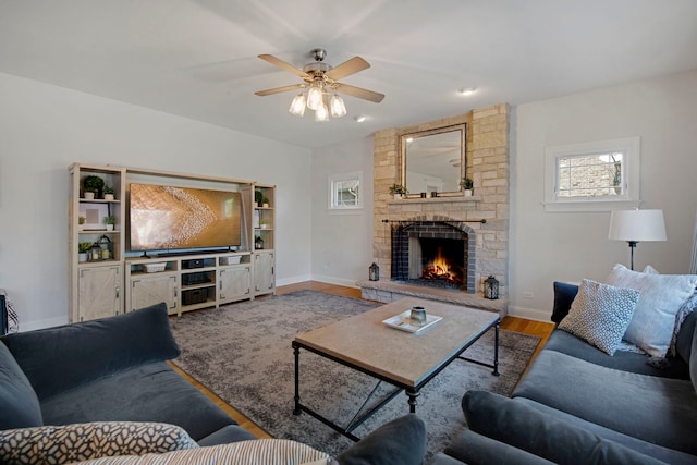 785 N Emroy Ave, Elmhurst, IL 60126 - living room with a ceiling fan, wood finished floors, a fireplace, and baseboards