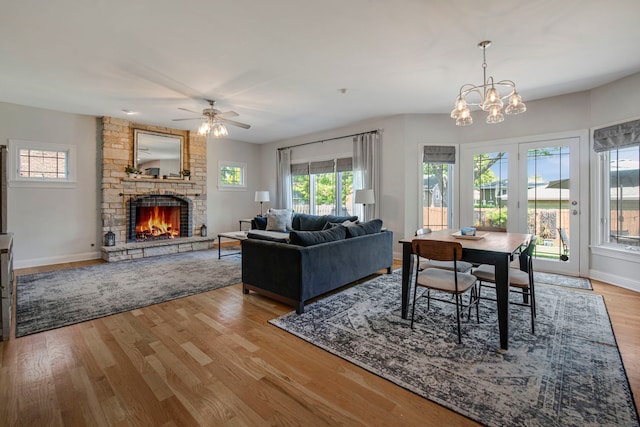 785 N Emroy Ave, Elmhurst, IL 60126 - living room featuring wood finished floors, a fireplace, ceiling fan, and plenty of natural light