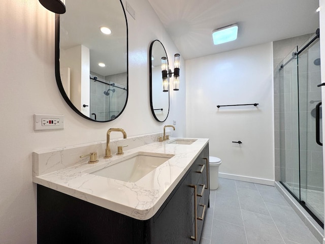 2326 Hamilton Pl Unit 2326, Schaumburg, IL 60194 - full bathroom featuring a shower stall, double vanity, toilet, and tile patterned floors