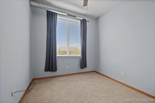 1673 Town Center St Unit 1673, Aurora, IL 60504 - spare room featuring carpet flooring and baseboards