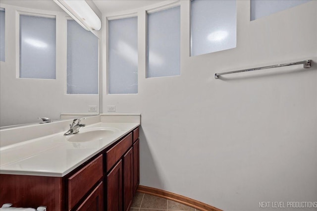 1673 Town Center St Unit 1673, Aurora, IL 60504 - bathroom with vanity, baseboards, and tile patterned floors