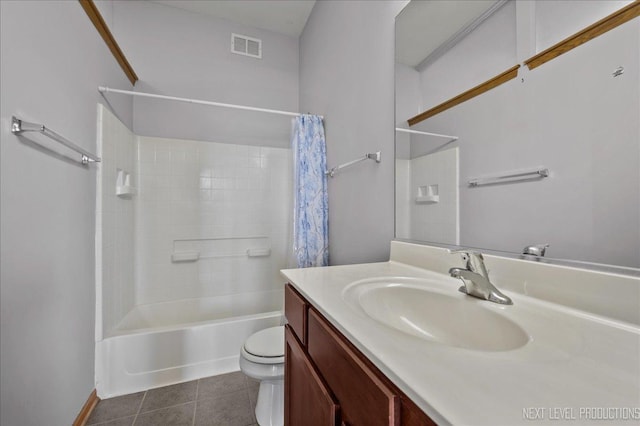 1673 Town Center St Unit 1673, Aurora, IL 60504 - full bath featuring vanity, toilet, shower / bath combo with shower curtain, and tile patterned flooring