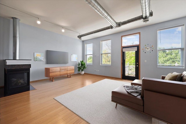 1673 Town Center St Unit 1673, Aurora, IL 60504 - living room with rail lighting and light wood finished floors