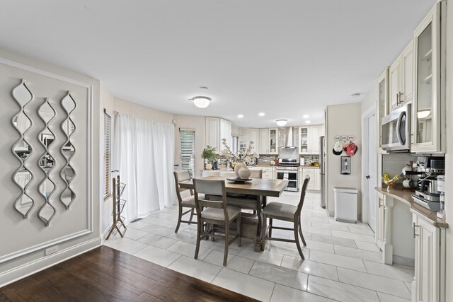 5225 Nicholas Ct, Oak Forest, IL 60452 - dining room with light tile patterned flooring and recessed lighting