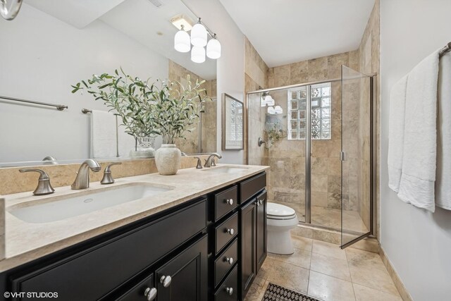 3539 N Lakewood Ave Unit 3, Chicago, IL 60657 - full bath featuring toilet, a shower stall, double vanity, tile patterned flooring, and baseboards