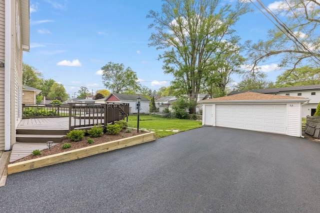 4520 Prince St, Downers Grove, IL 60515 - view of home's exterior with a detached garage, a deck, and a residential view