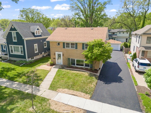 4520 Prince St, Downers Grove, IL 60515 - view of front of property with a detached garage, an outbuilding, a front yard, and a residential view