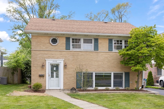 4520 Prince St, Downers Grove, IL 60515 - view of front of home with brick siding, central AC, and a shingled roof