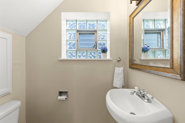 4520 Prince St, Downers Grove, IL 60515 - bathroom with a sink, toilet, and lofted ceiling
