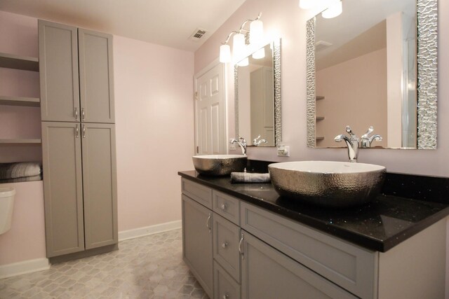 218 Partridge Ct, Algonquin, IL 60102 - bathroom featuring double vanity and baseboards
