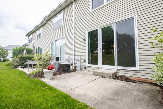 218 Partridge Ct, Algonquin, IL 60102 - back of house featuring a patio and a yard
