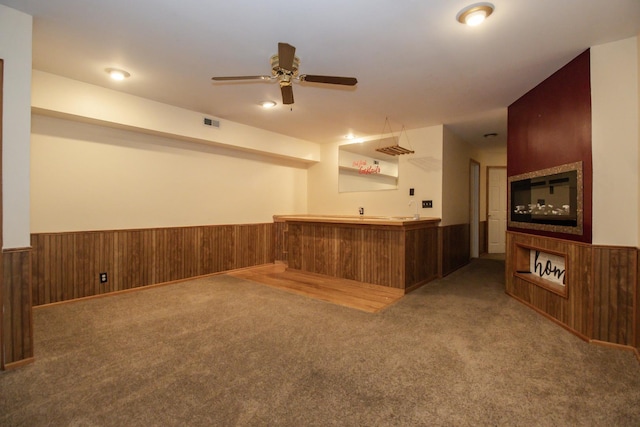 218 Partridge Ct, Algonquin, IL 60102 - indoor wet bar featuring wainscoting, carpet flooring, wood walls, and ceiling fan