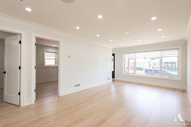 6012 S Narragansett Ave, Chicago, IL 60638 - empty room with ornamental molding, light wood-style flooring, baseboards, and recessed lighting