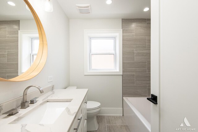 6012 S Narragansett Ave, Chicago, IL 60638 - full bathroom featuring vanity, toilet, baseboards, and recessed lighting