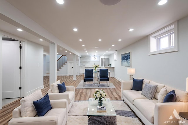 6012 S Narragansett Ave, Chicago, IL 60638 - living room featuring light wood finished floors, recessed lighting, and stairs
