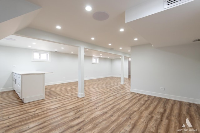6012 S Narragansett Ave, Chicago, IL 60638 - below grade area featuring light wood-type flooring, recessed lighting, and baseboards