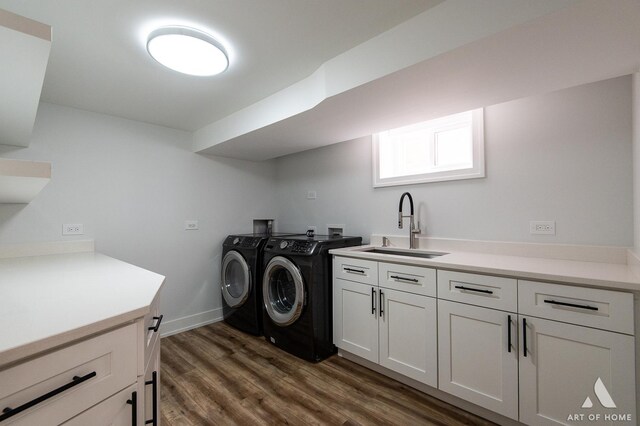 6012 S Narragansett Ave, Chicago, IL 60638 - laundry room with a sink, washer and clothes dryer, and dark wood-type flooring