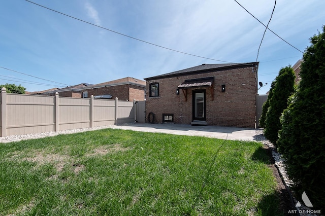 6012 S Narragansett Ave, Chicago, IL 60638 - rear view of property with brick siding and a patio area