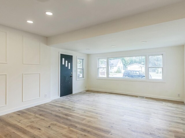 313 Grand Blvd, Loves Park, IL 61111 - foyer entrance with light wood-style flooring, recessed lighting, and baseboards