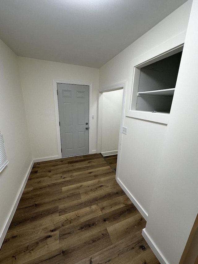 313 Grand Blvd, Loves Park, IL 61111 - hall with dark wood-style flooring and baseboards